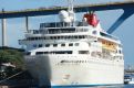 Cruise ship under the bridge